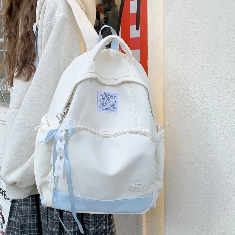 高颜值拼色初中生学生上课书包女高中生大容量双肩包百搭通勤背包