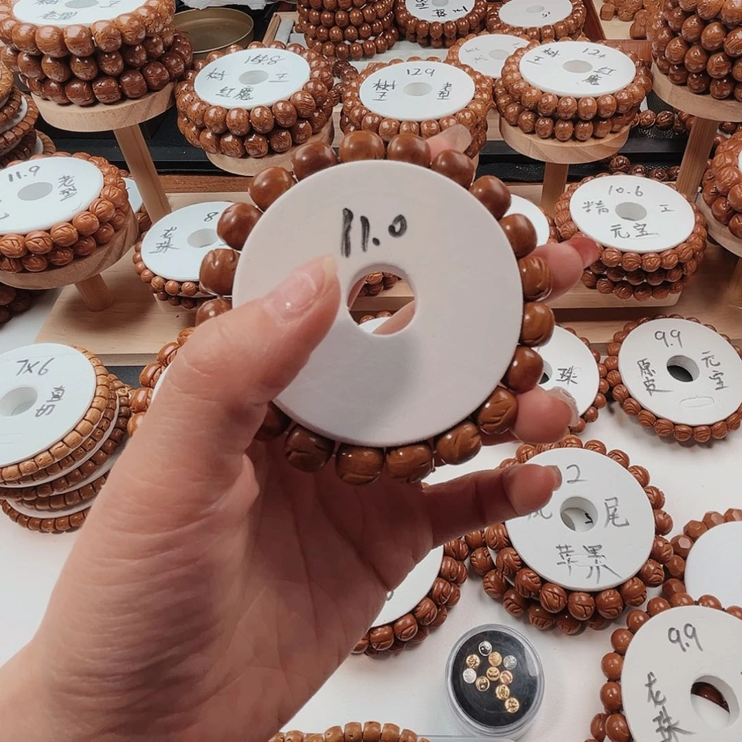 桃核手串党**心桃核光珠