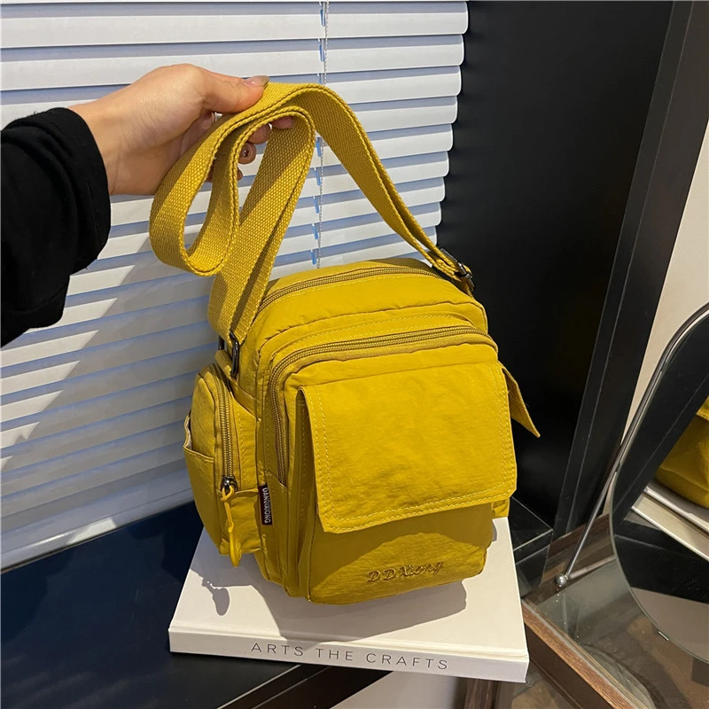 复古休闲多口袋通勤包相机包2025新款便携单肩包斜挎包女士小背包