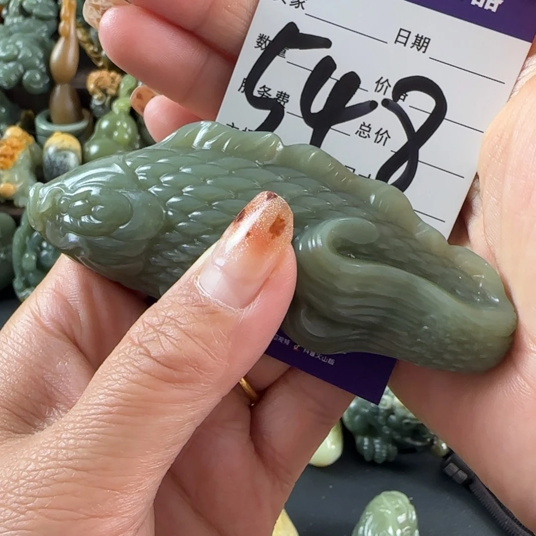 程***森透闪石质玉未镶嵌把件