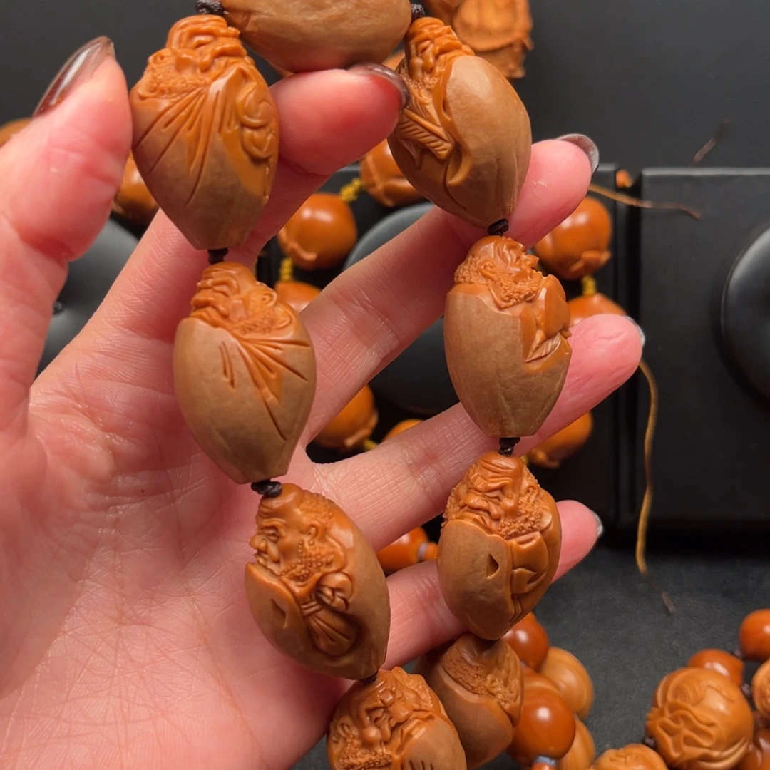 用***8橄榄核手串达摩手串