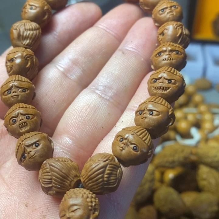 橄榄核手串45换个斤斤计较