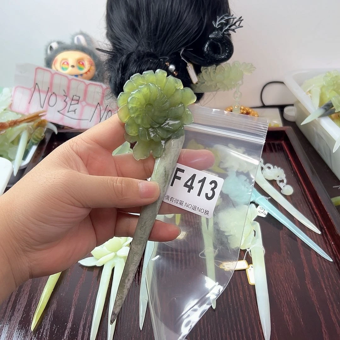 合金蛇纹石玉发饰窈****?