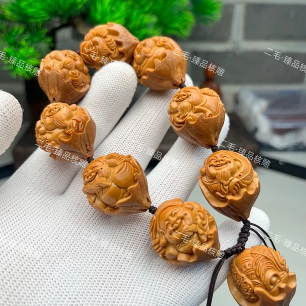 橄榄核四花料雕刻包衣财神尺寸2.4