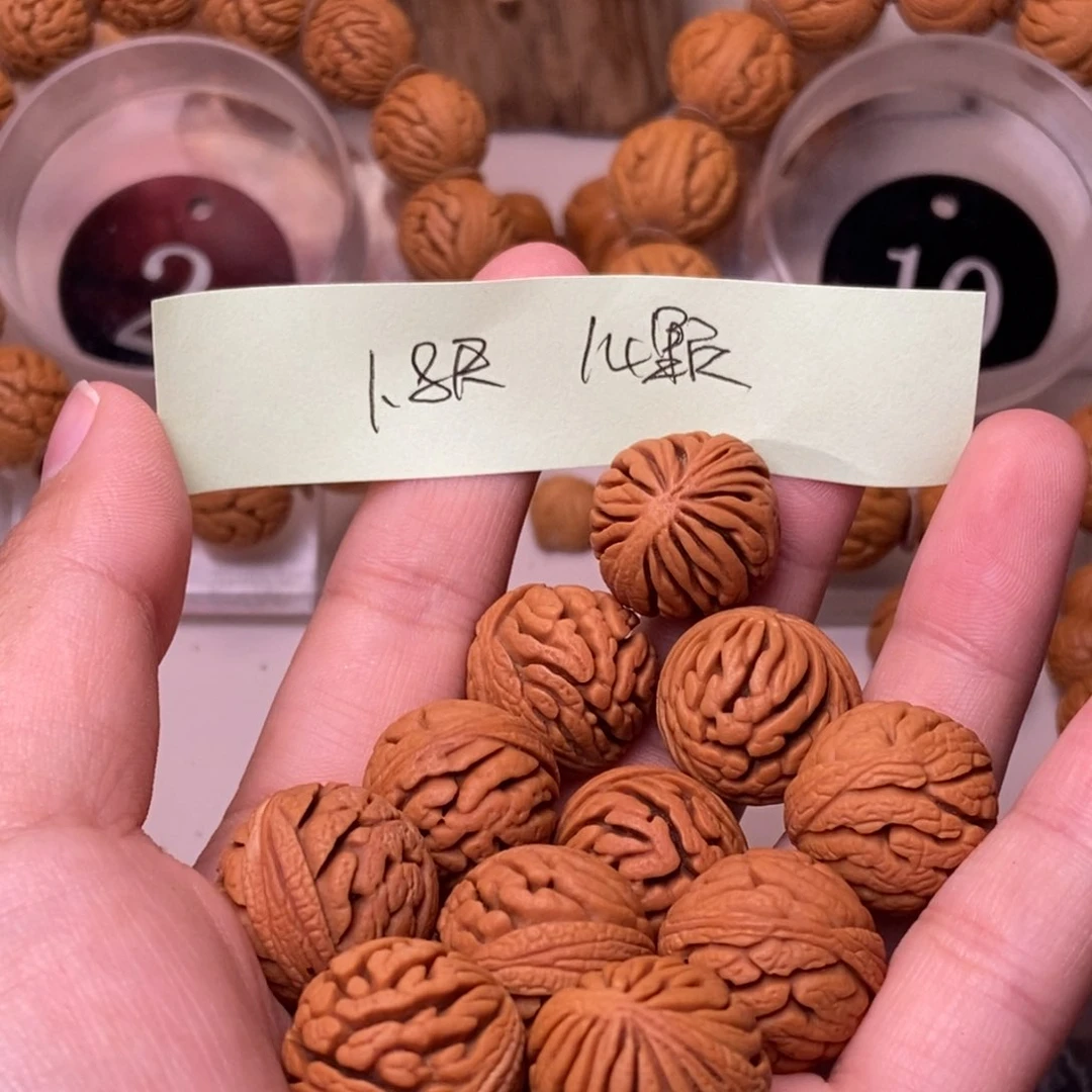 桃核吊坠o****$秦岭龙纹桃核手串15