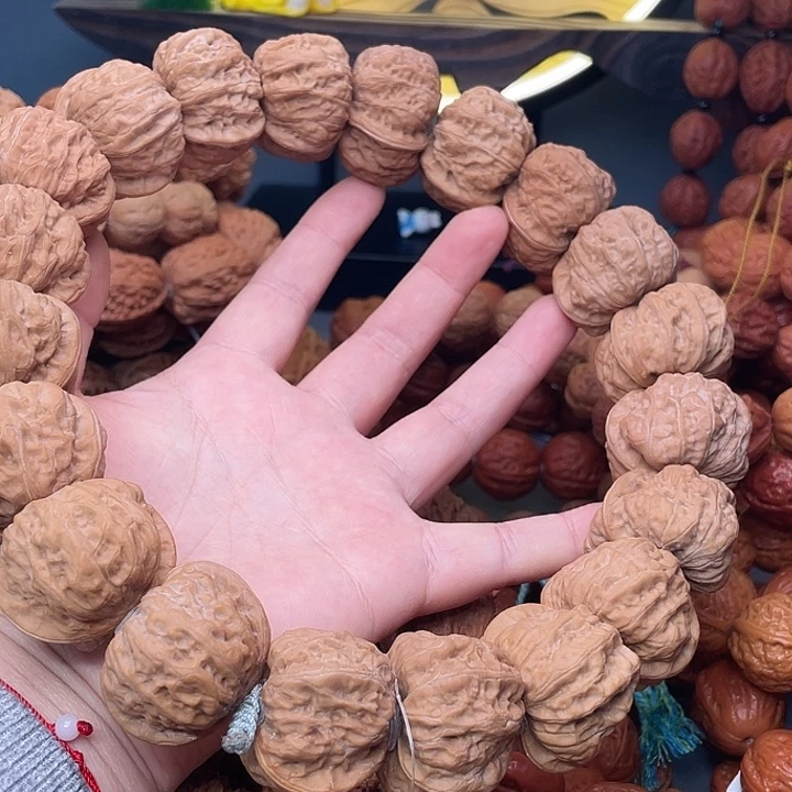 东***红手串文玩核桃元宝