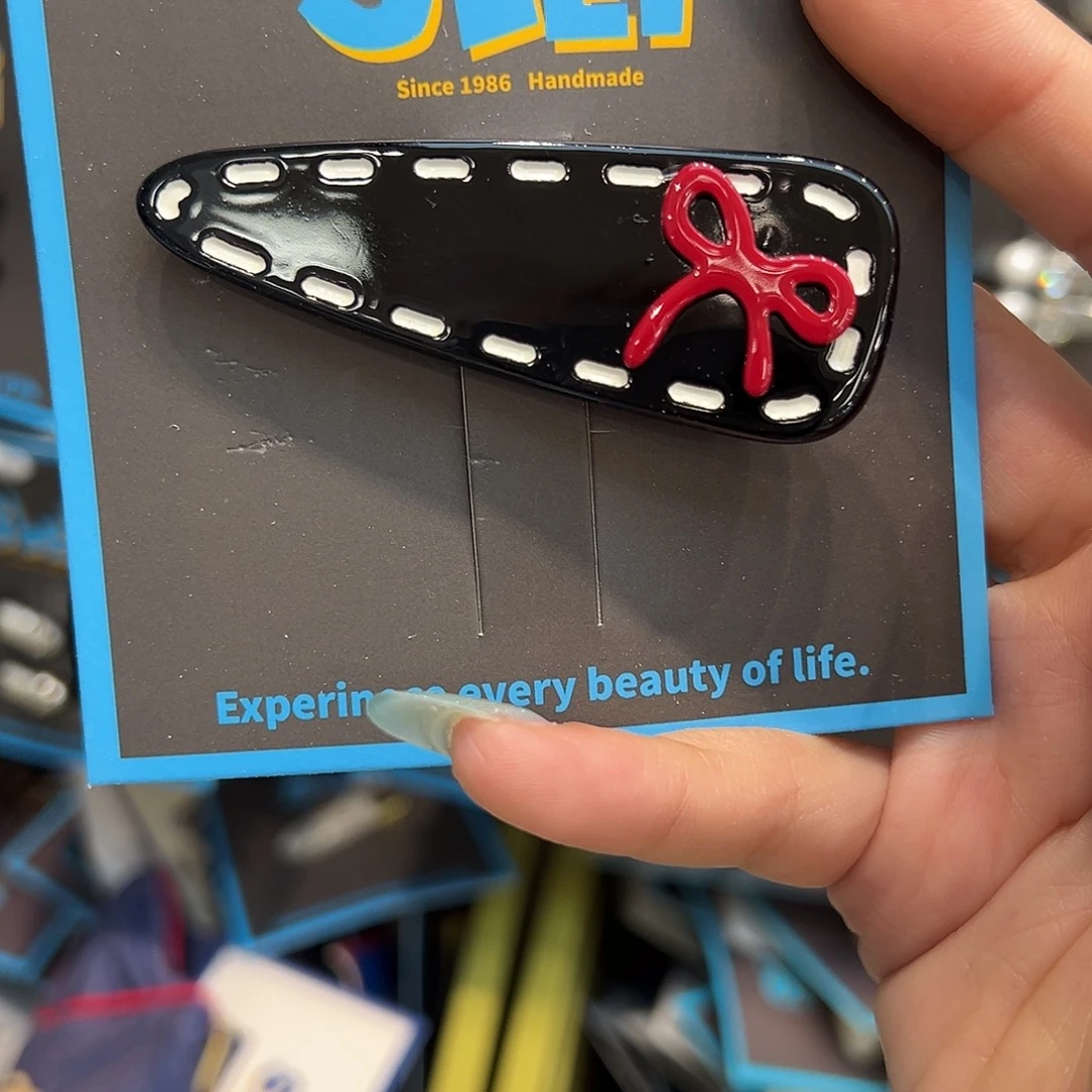 柠****非金属无黑色虚线红色蝴蝶结鸭夹