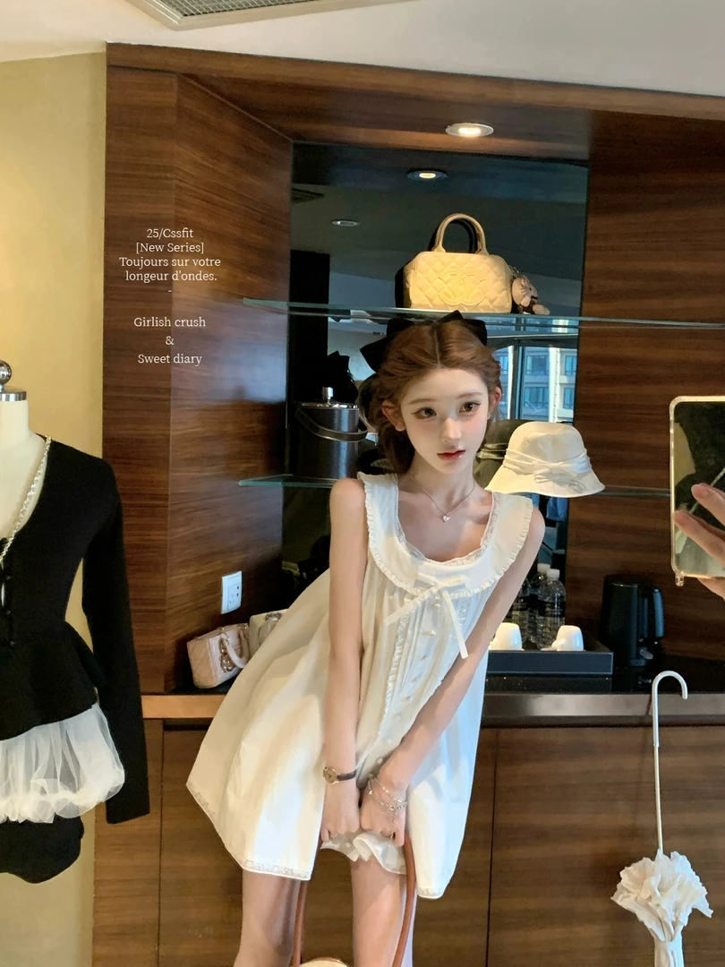 南洋初恋 法式甜美气质减龄蝴蝶结吊带连衣裙宽松显瘦薄款小白裙