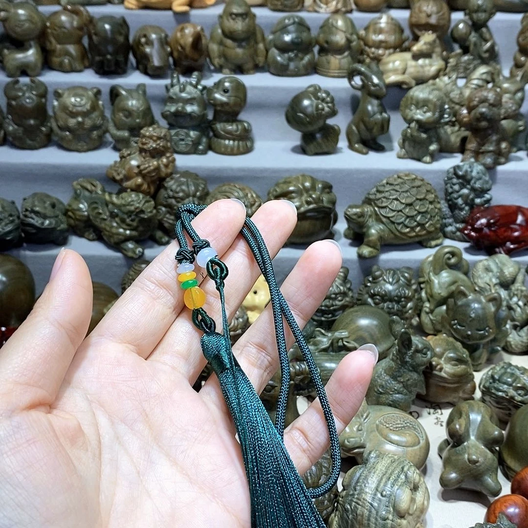 小***牛木雕刻件对手把绳子一条