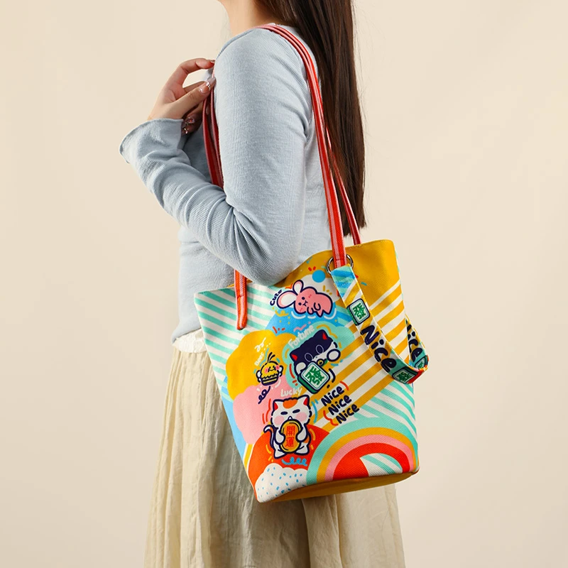 拾嘉/喵罐物语单肩斜挎大水桶包原创卡通文艺学院风