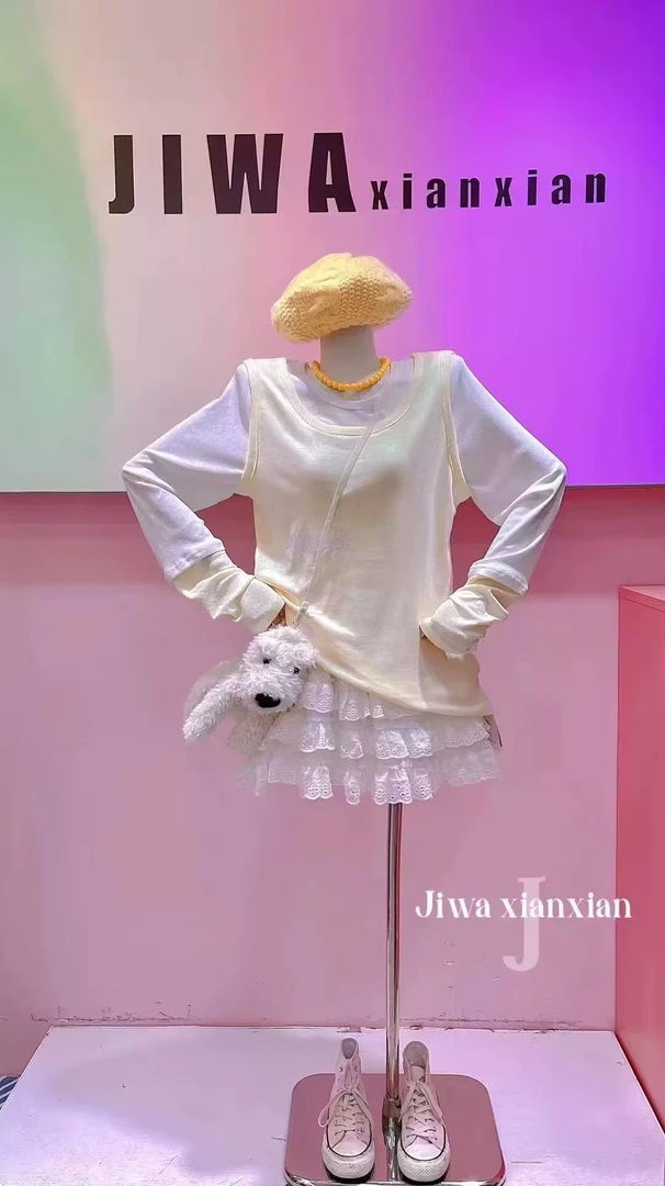 A23-2-4三色“符文”假两件背心长袖（28809）