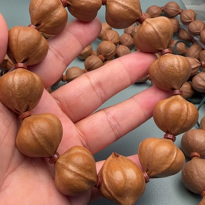 豆***爸橄榄核手串/手链橄榄核原皮铁核