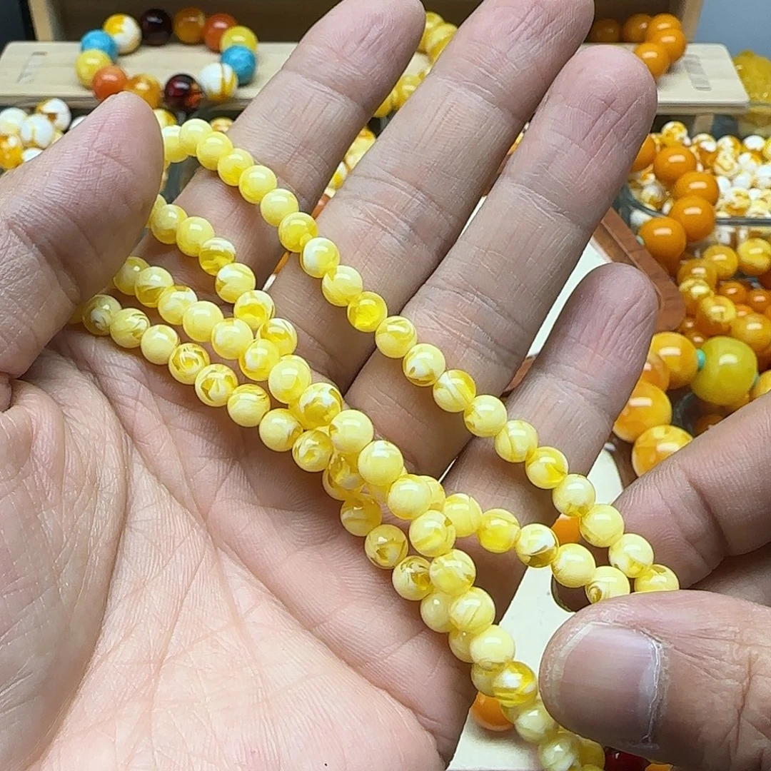茉***兰无非金属鸡油黄色素串搭配一条108