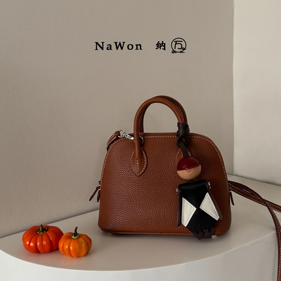 Nawon|半手工蜡线福宝马鞍皮 内里羊皮 保龄球贝壳手提单肩包