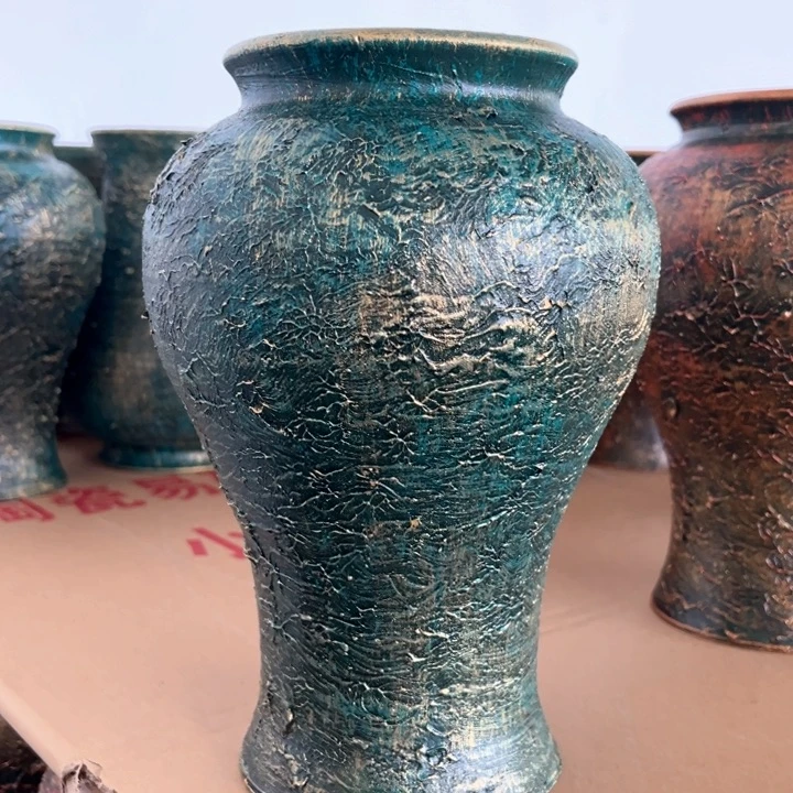 16.9-1微瑕土陶鱼尾绿浮