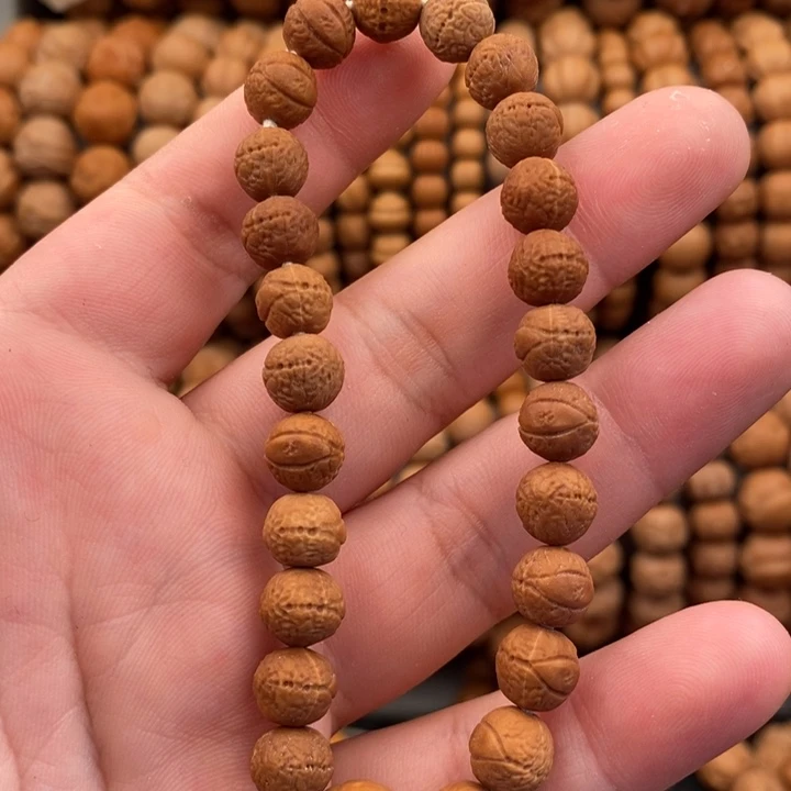 8+凤眼手持猴头手串二等