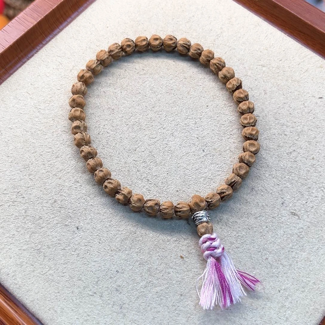 柏香籽/百香籽手串?****?-手持