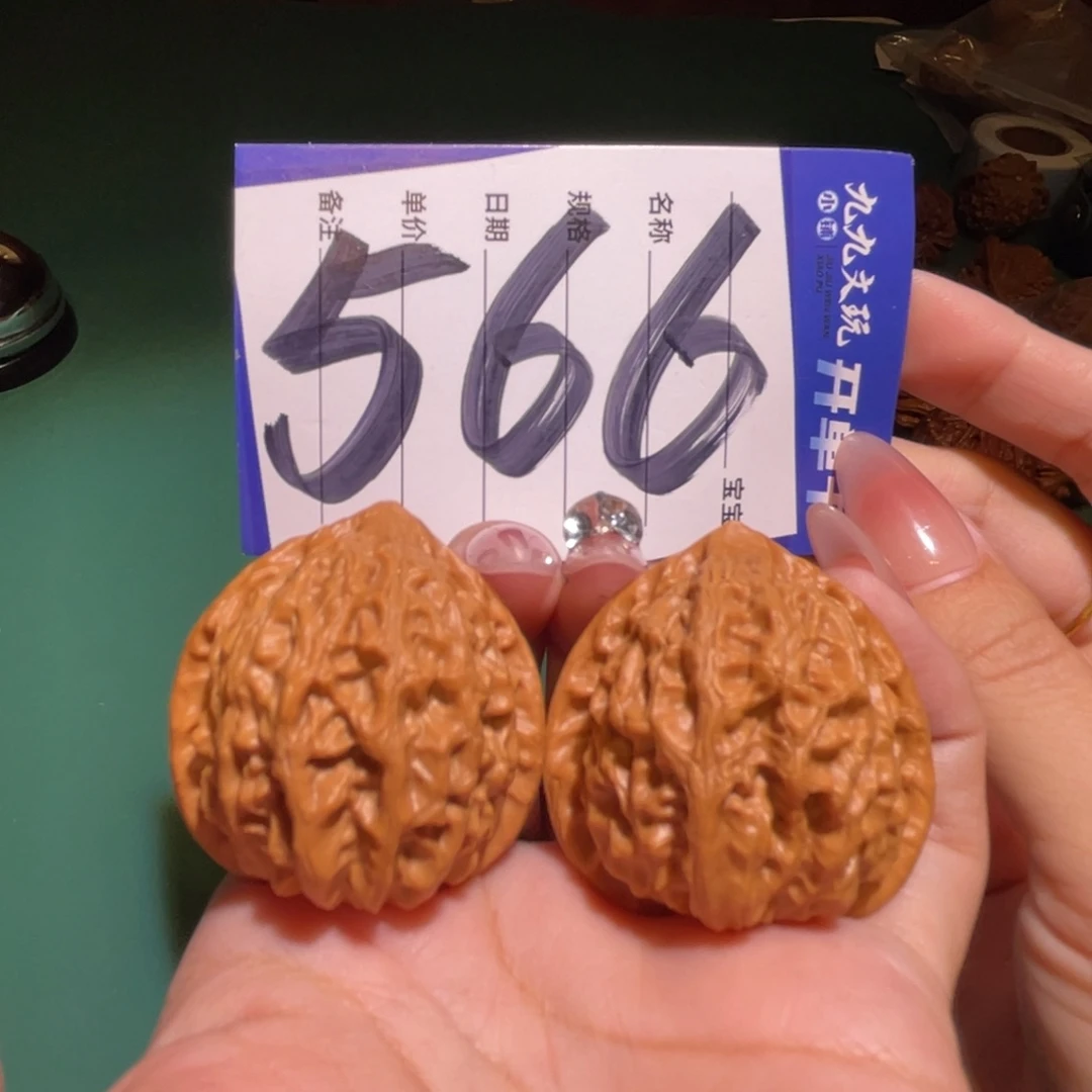 文玩核桃把件38金牛