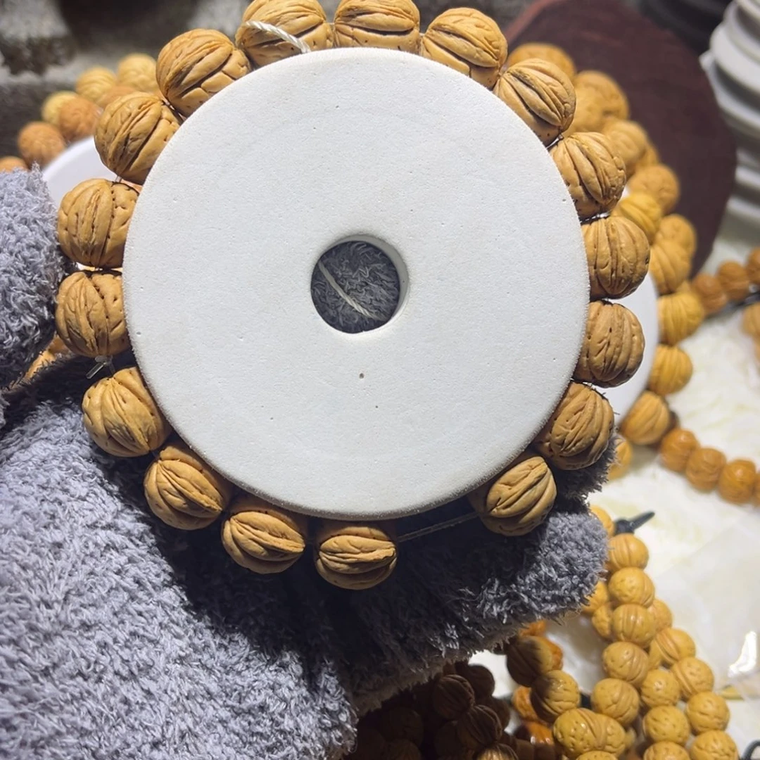 超***娃桃核吊坠盘锦肌肉小宽脐手串