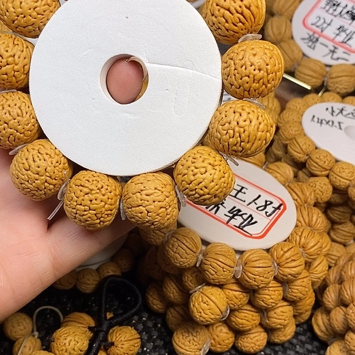 莹***鑫桃核手串白月光21/22