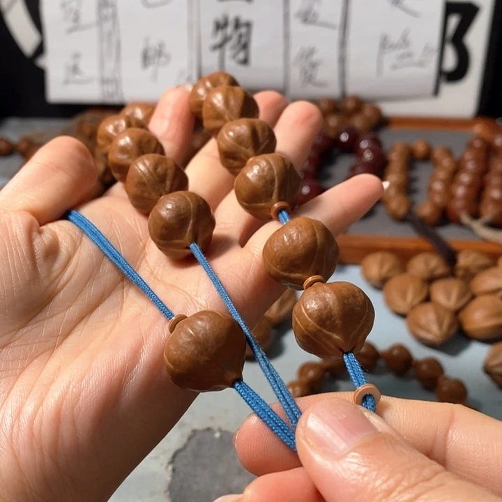 光***大手串橄榄核0271精品蒜头铁核12+1颗