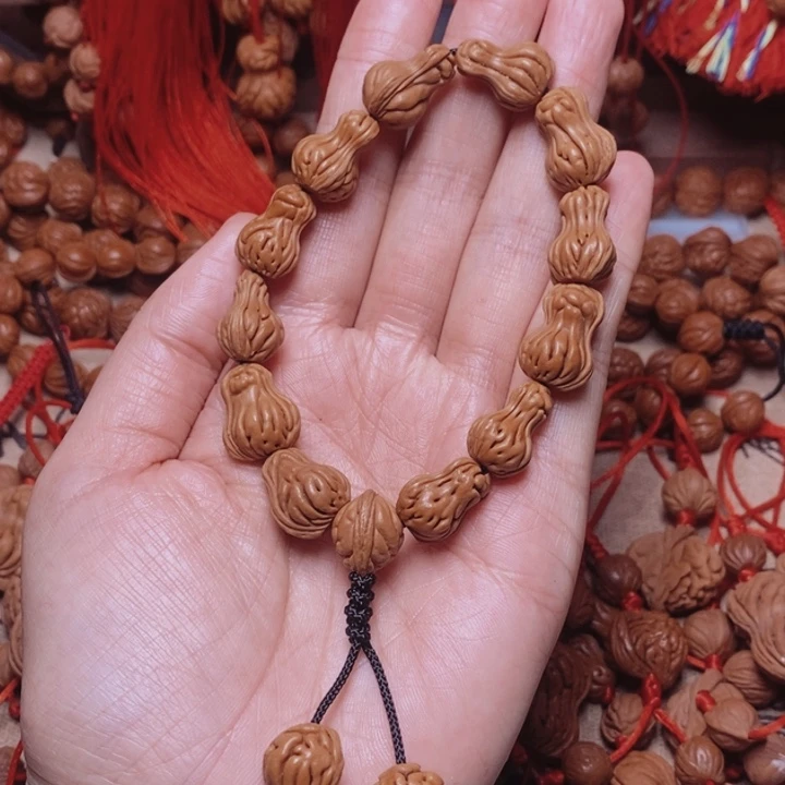 吊坠桃核桃枭手串
