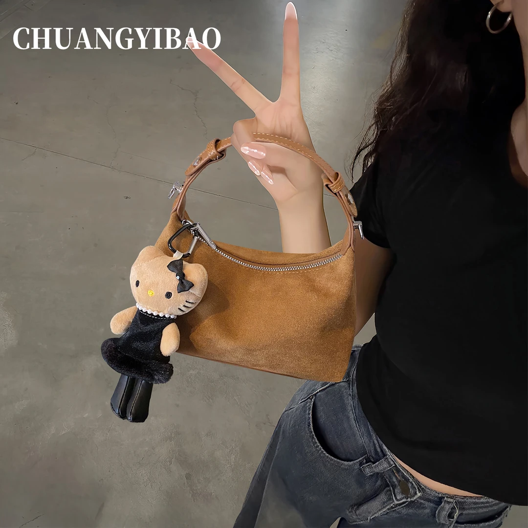 复古麂皮绒手拎小饺子包包女式2025新款超火单肩包通勤百搭斜挎包