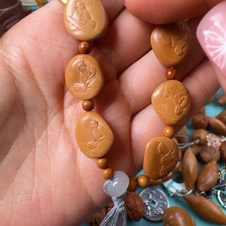 陈***杰橄榄核手串/手链核潮核雕手工制作