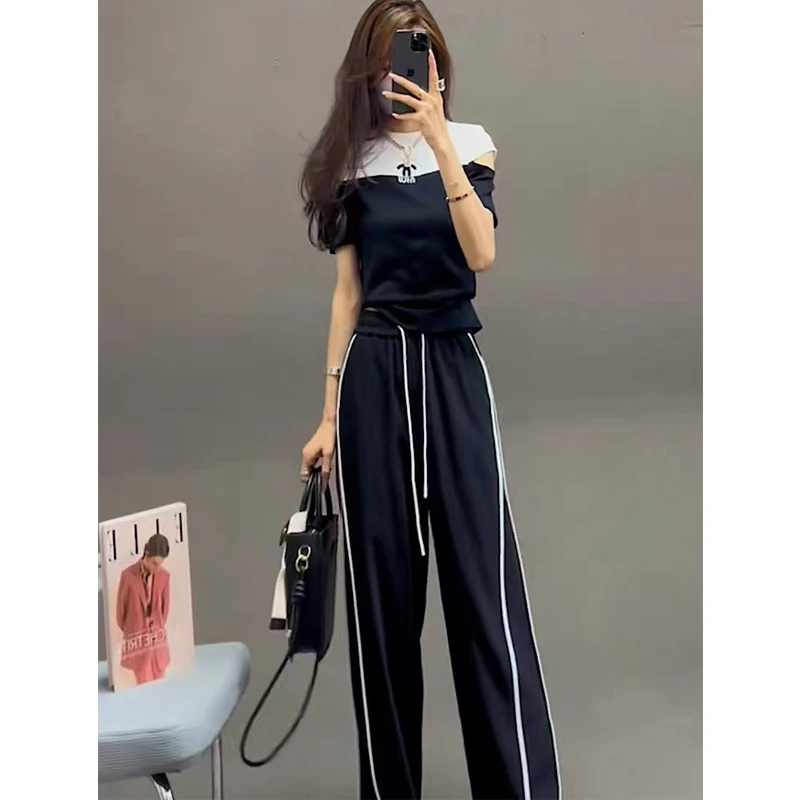 46.5%人棉 夏款露肩双拼色短袖两件套女 流行运动套装女