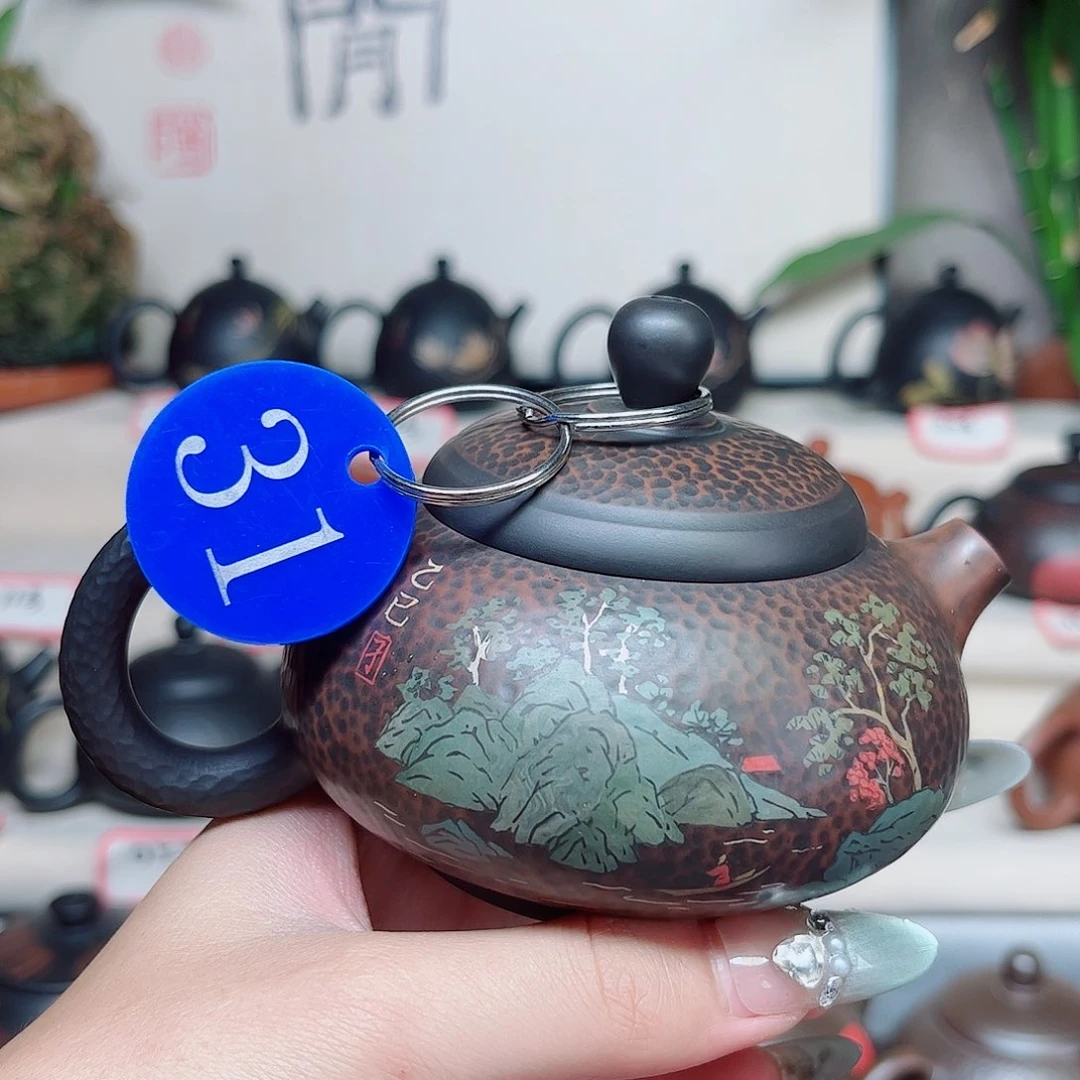 170毫升微微瑕纯手工锤纹多道刻填胖墩壶
