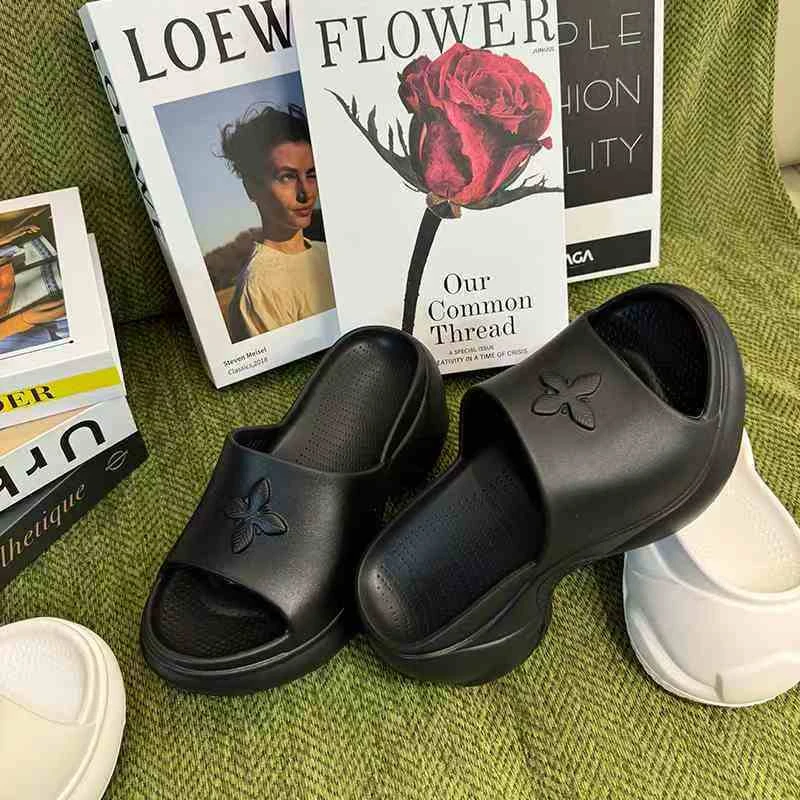 十字花9公分女士休闲拖鞋（微瑕有瑕疵介意者勿拍）