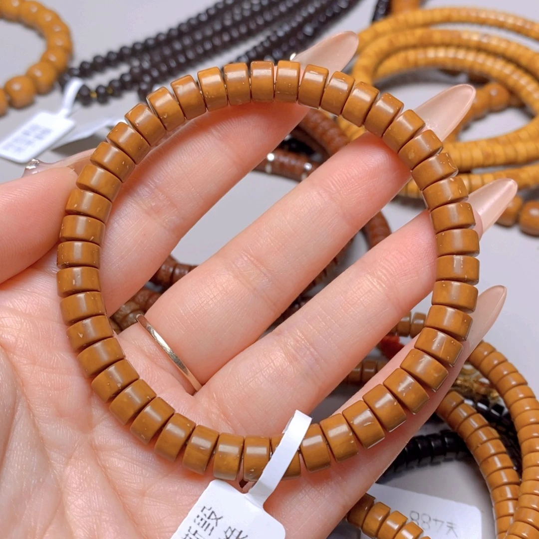 浩***己手串紫金鼠6.鼠尖料药片单圈7.5