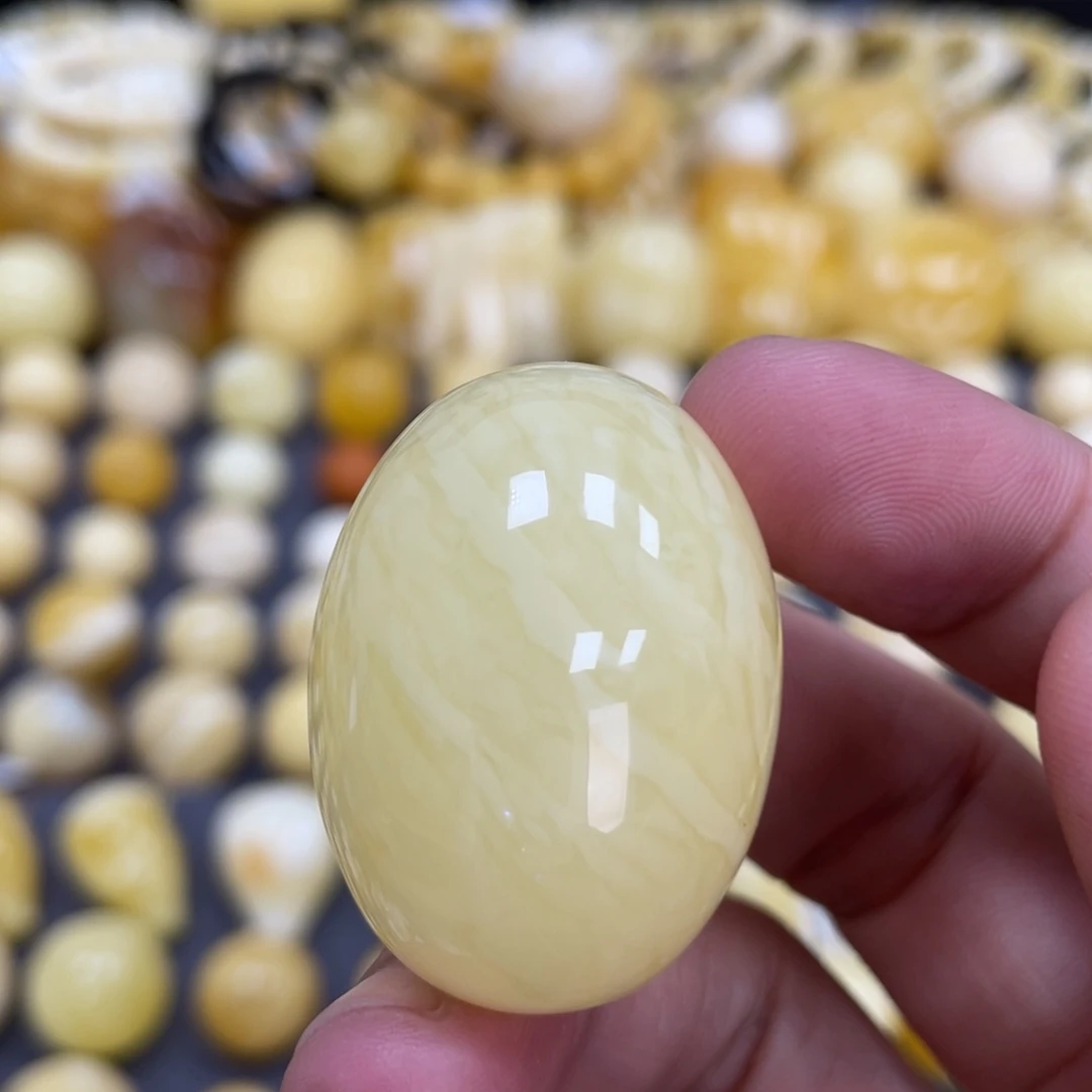 琥珀未镶嵌裸石25*34.9mm妖花虎皮枣珠