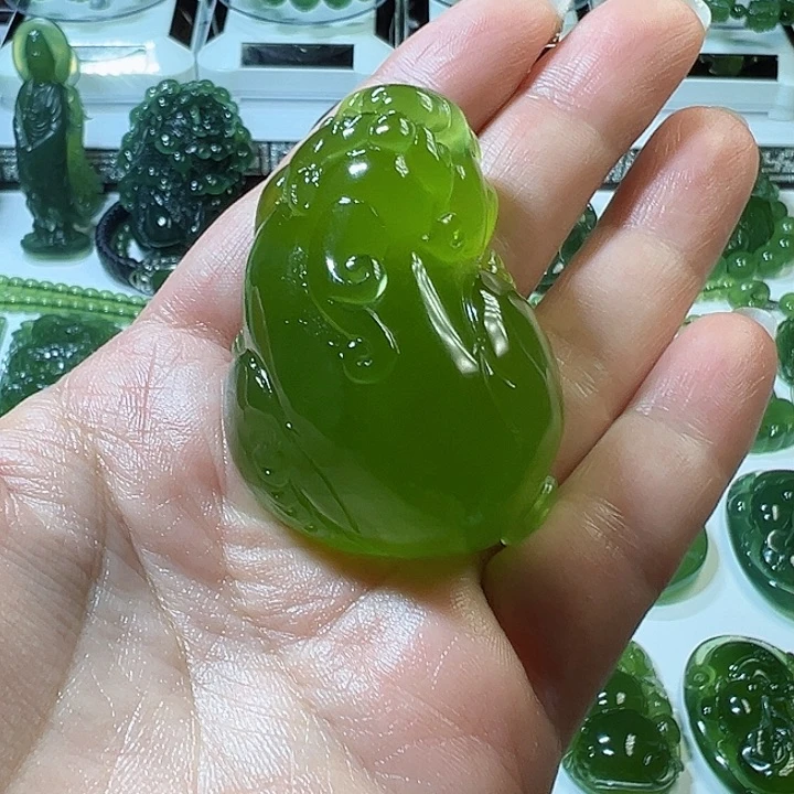 蛇纹石玉手把件未镶嵌意****哈