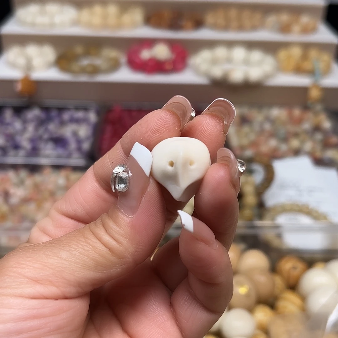 ^***੭手串菩提根/象牙果瑕疵白色饺子1颗
