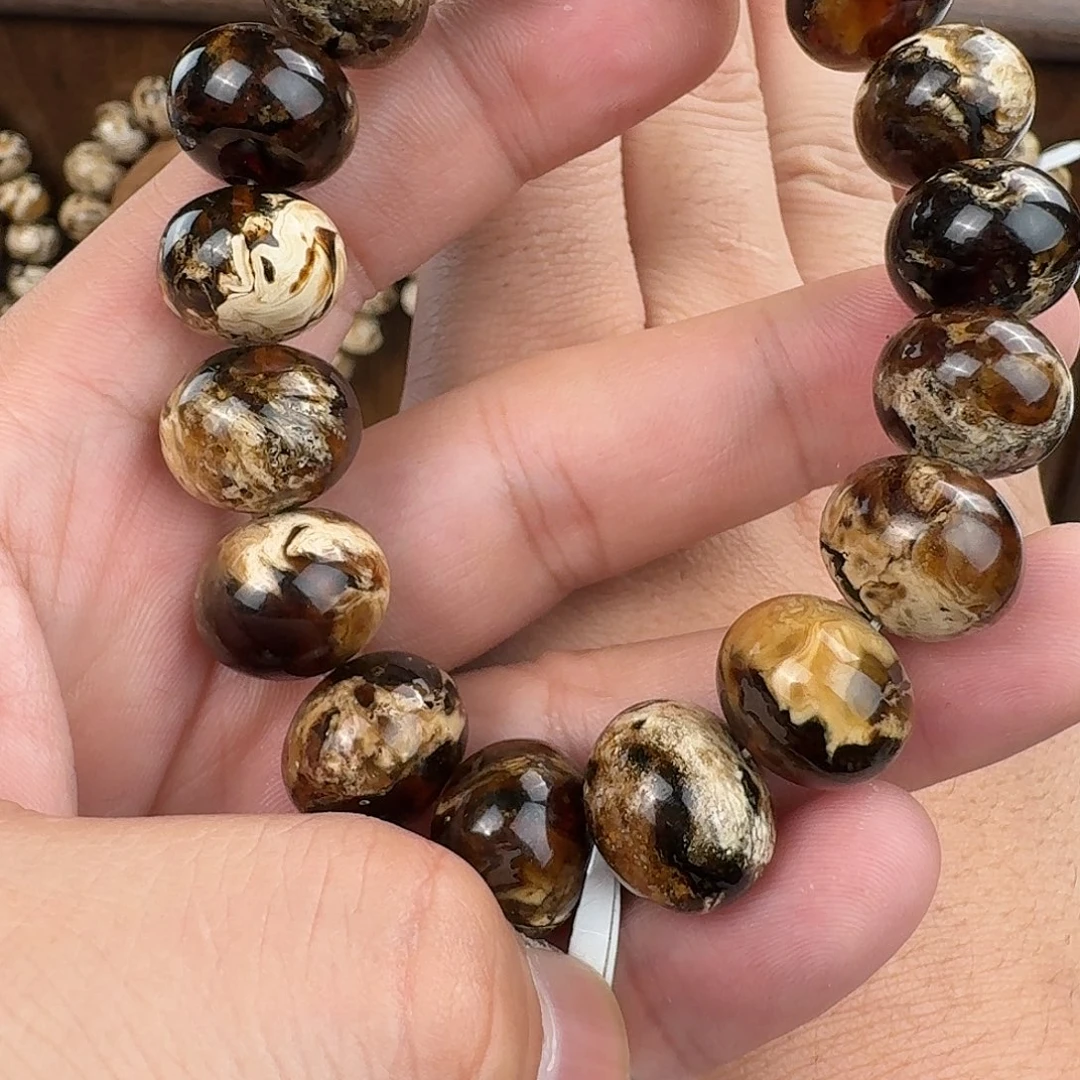 L***n琥珀未镶嵌手串黑金