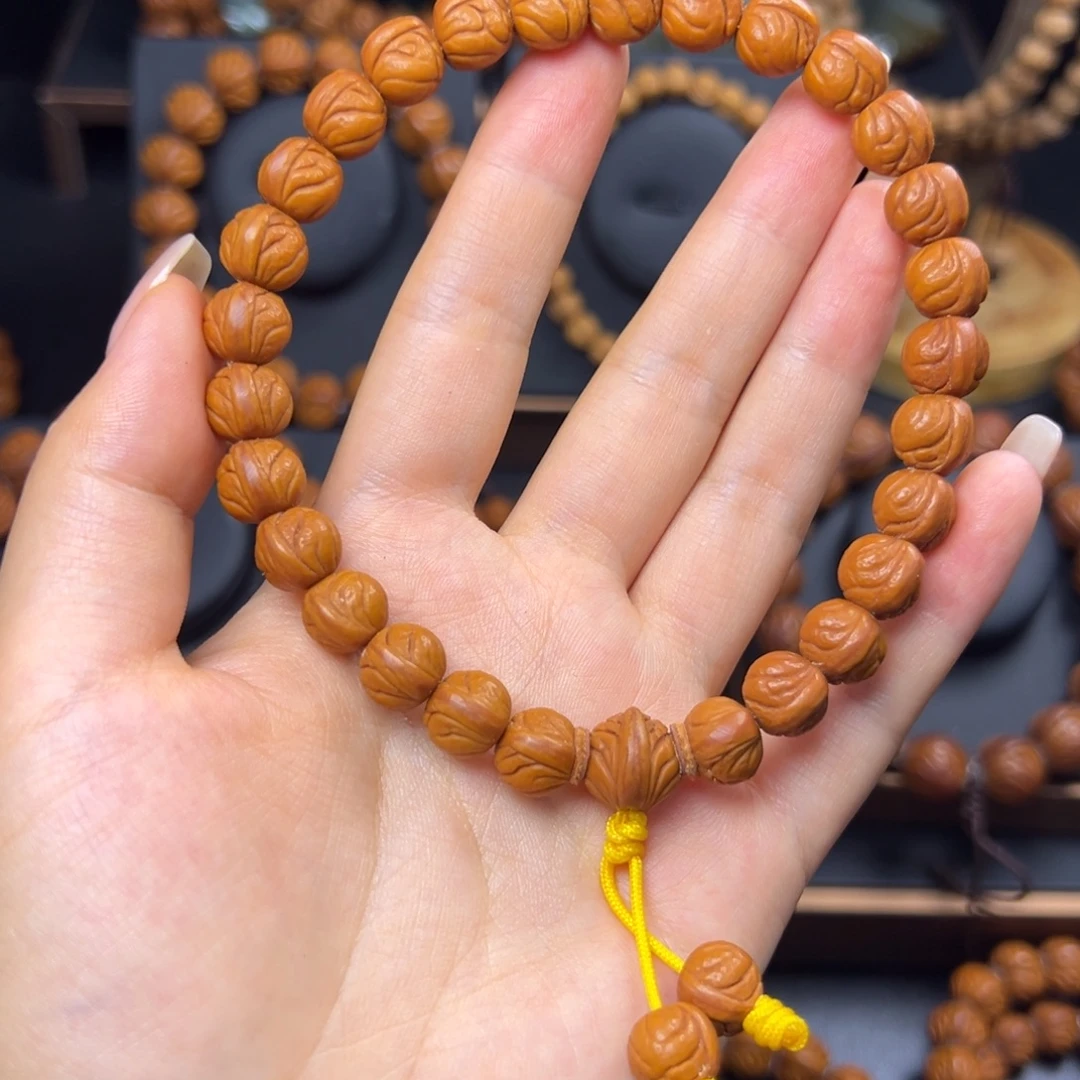 雨***辰手串桃核野生玉龙脊10