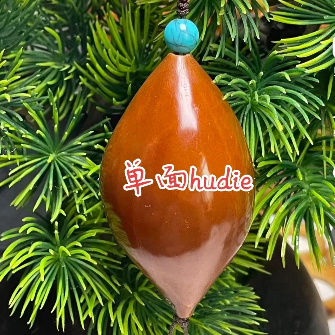 手工雕刻单面生命大尺寸橄榄核手把件带竹环穿配设计独特