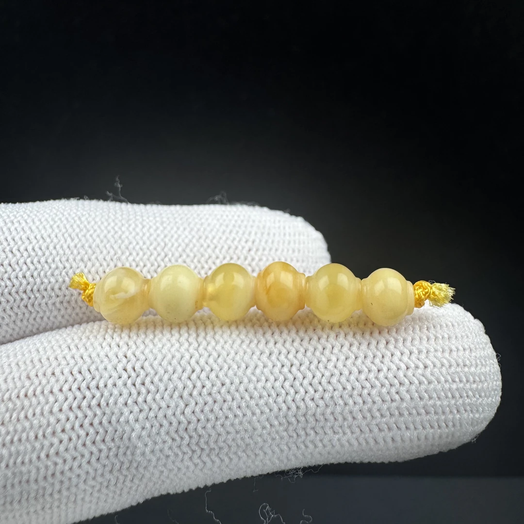K4020天然原矿蜜蜡 隔珠6.7mm支持复检假一罚十