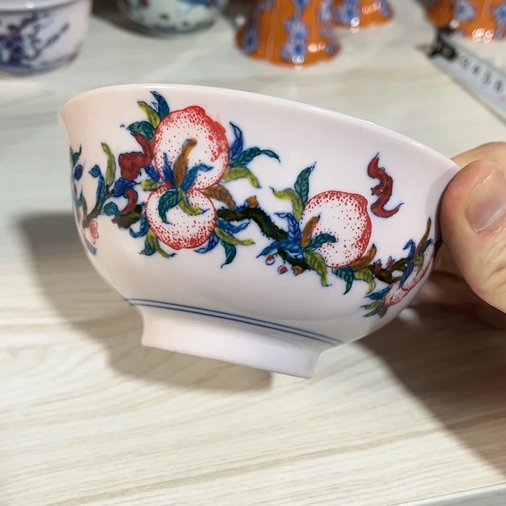 瓷片//////////直径12.5厘米。红。