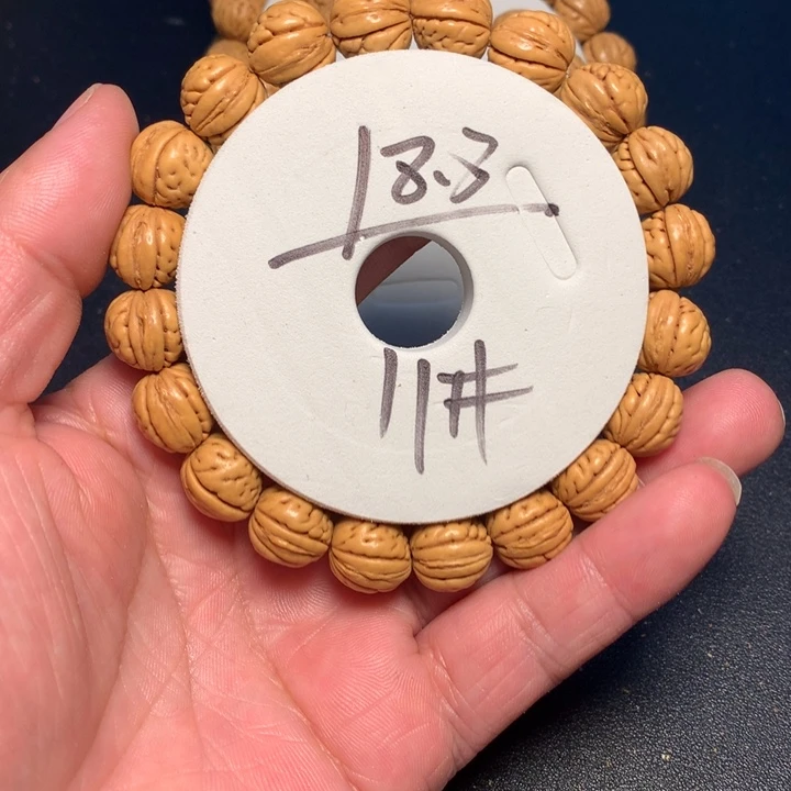 桃核手串11号健健康康了