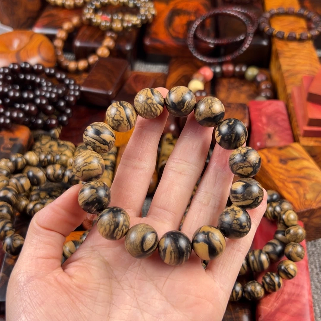 海***手黑白檀1.5高花手串