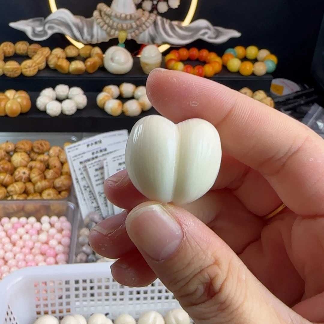 庞***胖菩提根/象牙果吊坠牙果卡25拉丝爱心1个