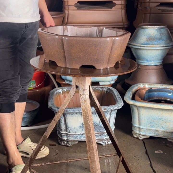 鄧***歌紫砂花盆高温处理