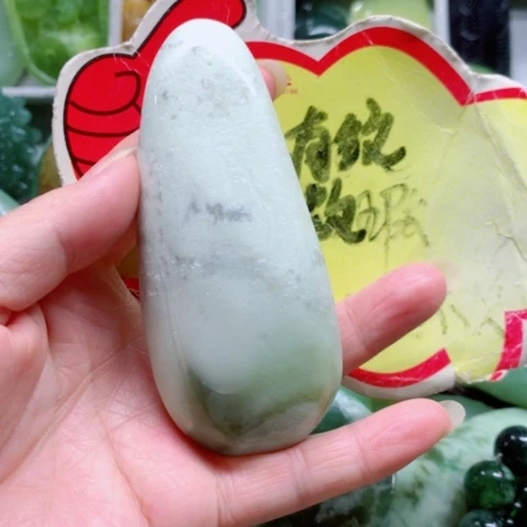 未镶嵌蛇纹石玉手把件