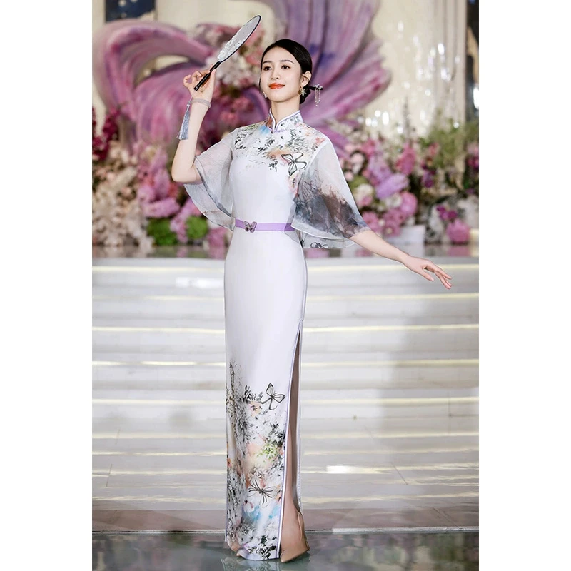 蔓萝澜蝶戏春花2025年春新款高端走秀旗袍气质长款演出服白色礼服