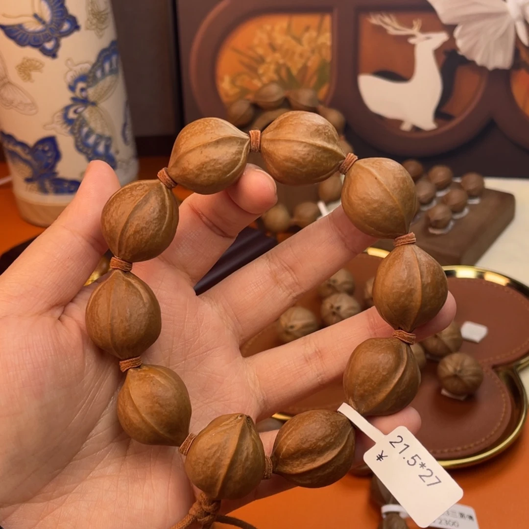 萬***爭橄榄核手串/手链21.527梅林铁核