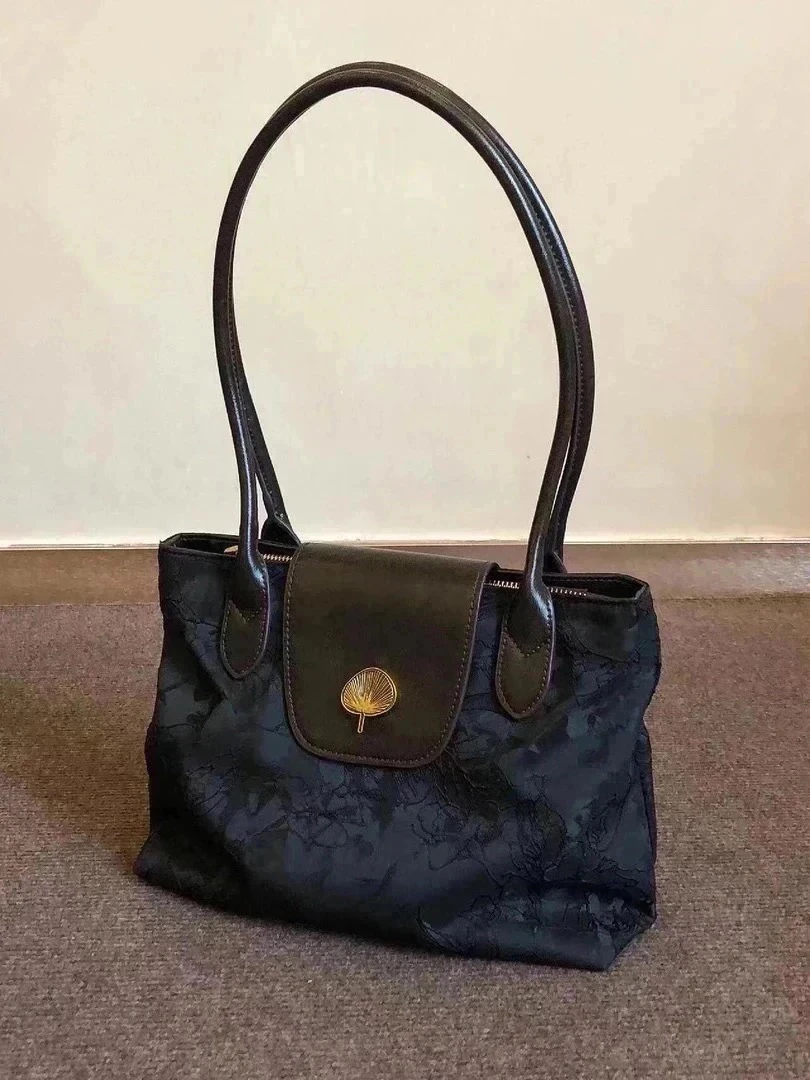 331到399复古女包