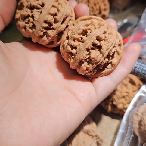 新***族吊坠文玩核桃44粗筋