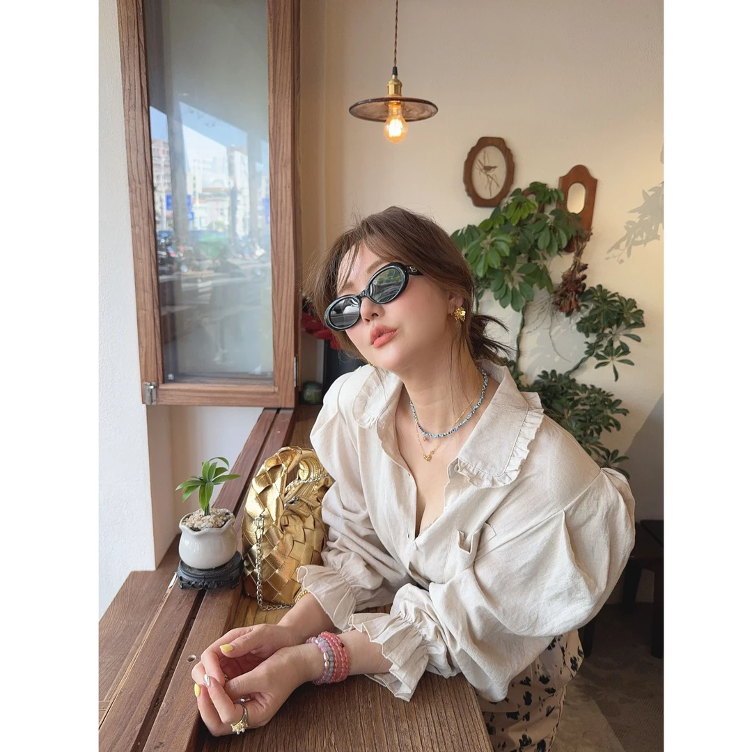 智英欧尼【麻衬衫 米色气质泡泡袖设计感娃娃领宽松时尚春季】